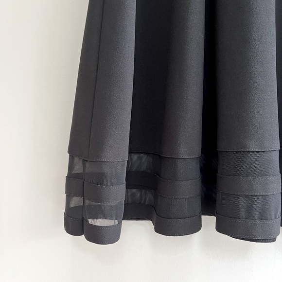 NWT Calvin Klein Sleeveless Fit And Flare Black Dress With Sheer Hem Detail, 12 - Picture 9 of 10